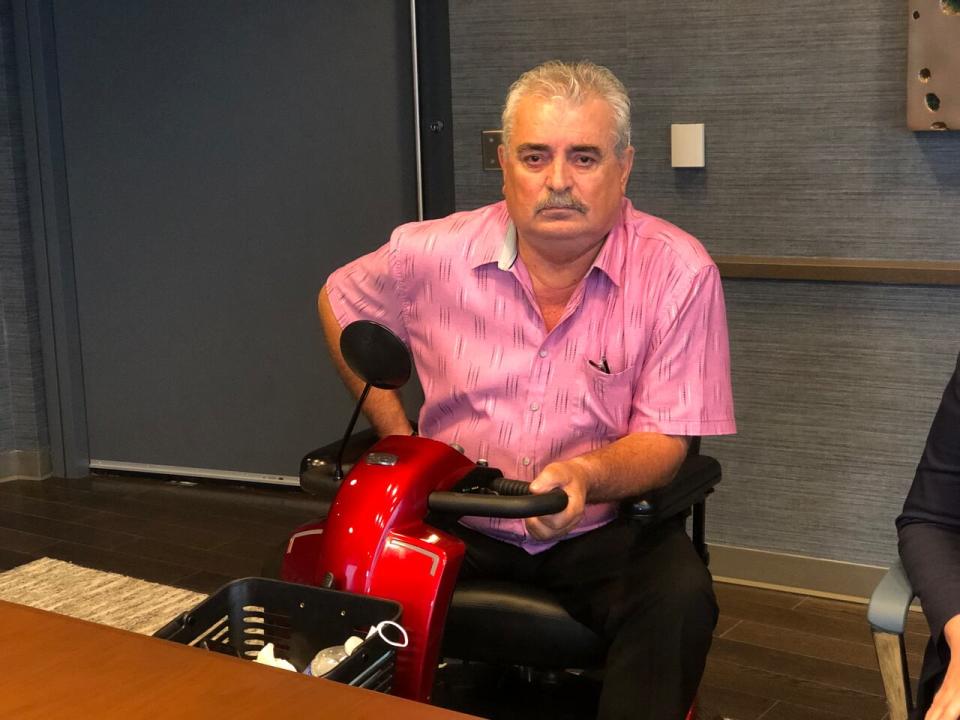 Harry Spyridis suffered a car crash in October 2021 and was forced to use a mobility scooter. He now requires a personal support worker but his insurance company is only offering coverage below minimum wage.