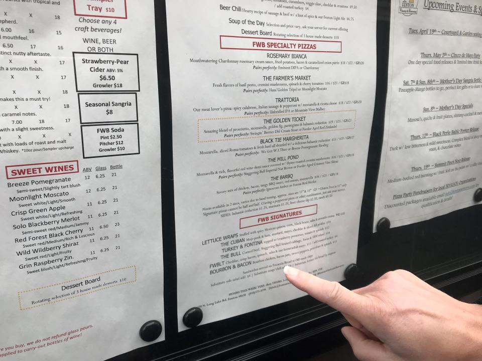 Some restaurants are finding new ways to cut costs, including roasting a turkey instead of buying deli meats. Co-owner Ginny Sherrow points to the Turkey & Fontina sandwich priced at $12 that now uses roast turkey.