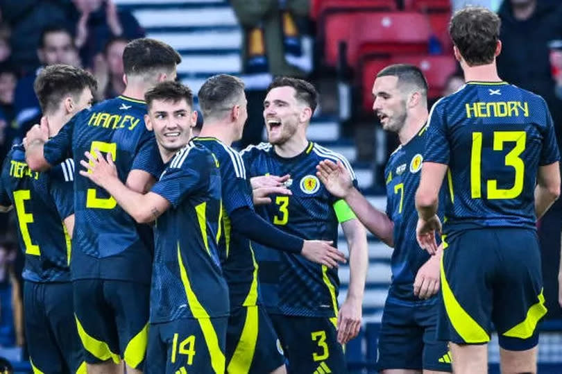 Scotland players celebrate after going 1-0 up against Finland at Hampden