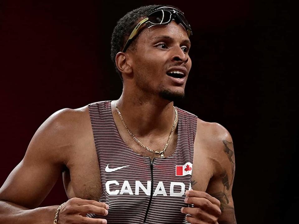 Sprinter Andre De Grasse will not compete this week at the Canadian track and field championship in Langley, B.C. after testing positive for COVID-19 upon his return from France, where he ran a season-best time in the 200 metres on Saturday at the Meeting de Paris Diamond League meet. (Javier Soriano/AFP/Getty Images - image credit)