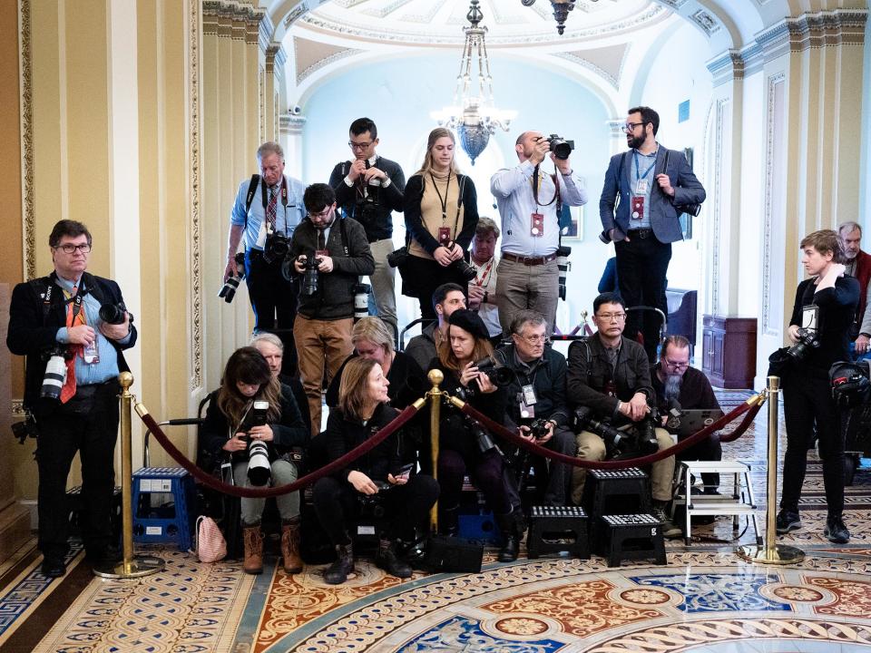 Press photographers covering the trial are confined to a small enclosure: Barcroft Media/Getty