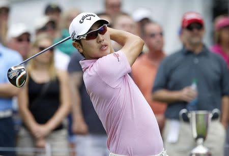 Sang-Moon Bae hits his tee shot on the first hole during the final round of the Travelers Championship at TPC River Highlands. Mandatory Credit: David Butler II-USA TODAY