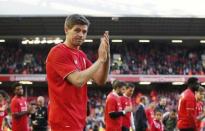 Liverpool's Steven Gerrard applauds fans as he walks on the pitch after his final game at Anfield. Liverpool v Crystal Palace - Barclays Premier League - Anfield - 16/5/15. Reuters / Phil Noble Livepic