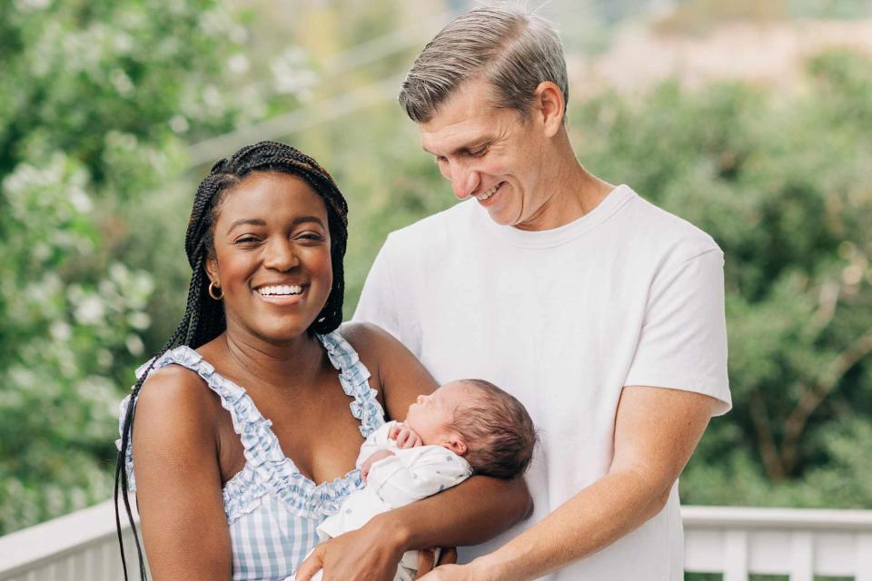 <p>Betsy Newman</p> Krys Marshall and Ted Dolan with baby