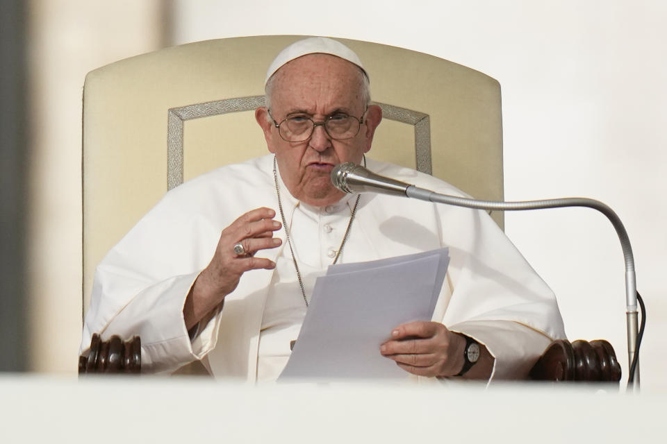 FILE - Pope Francis speaks during his weekly general audience in St. Peter's Square at The Vatican, on Oct. 18, 2023. Pope Francis has formally approved allowing priests to bless same-sex couples, with a new document released Monday Dec. 18, 2023 explaining a radical change in Vatican policy by insisting that people seeking God’s love and mercy shouldn’t be subject to “an exhaustive moral analysis” to receive it. (AP Photo/Alessandra Tarantino, File)