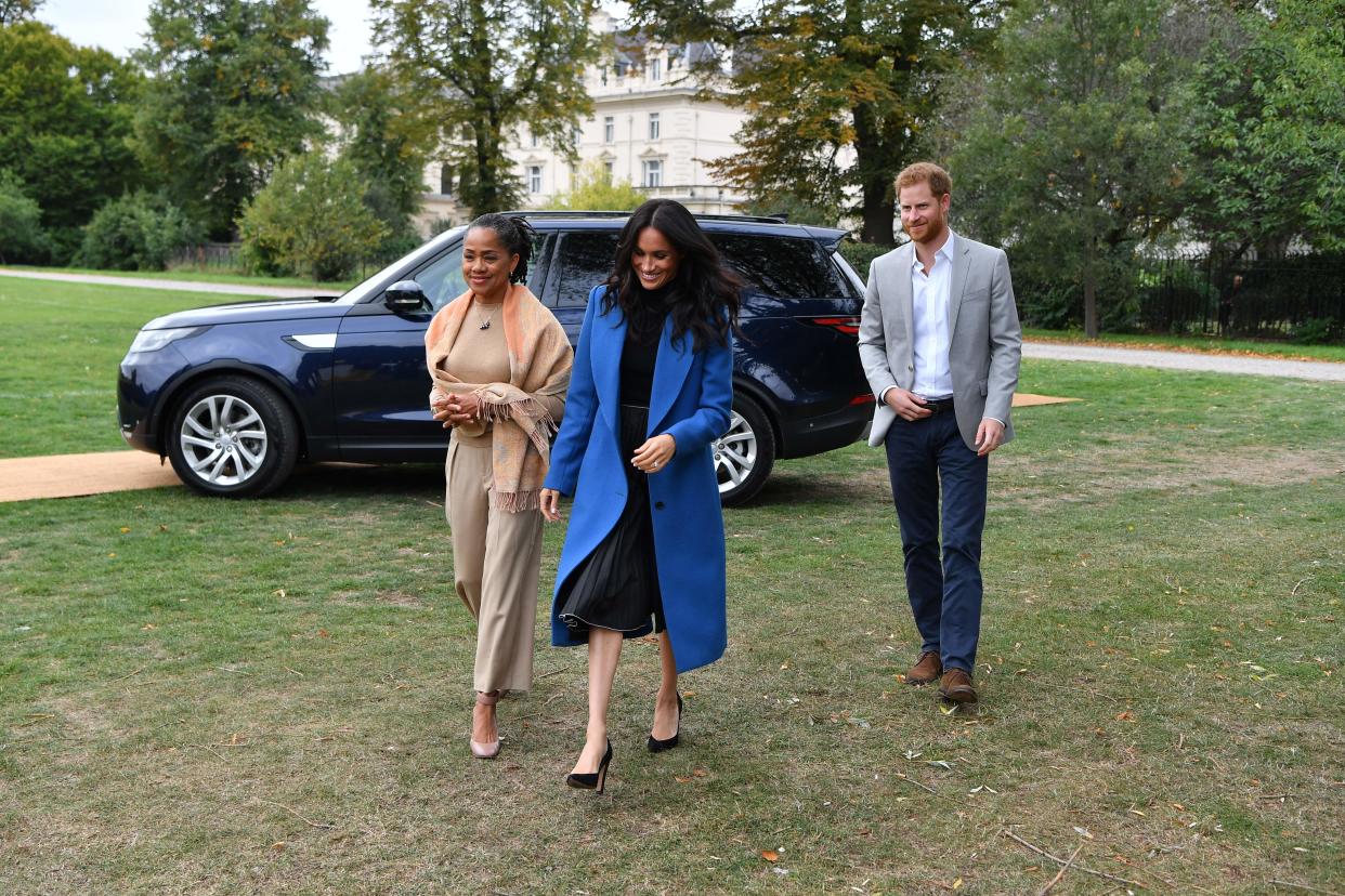 The Duchess of Sussex was joined by her mum Doria Ragland and Prince Harry for the cookbook launch [Photo: Getty]