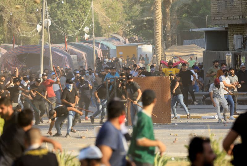 Supporters of Iraqi populist leader Moqtada al-Sadr protest inside the Green Zone, in Baghdad