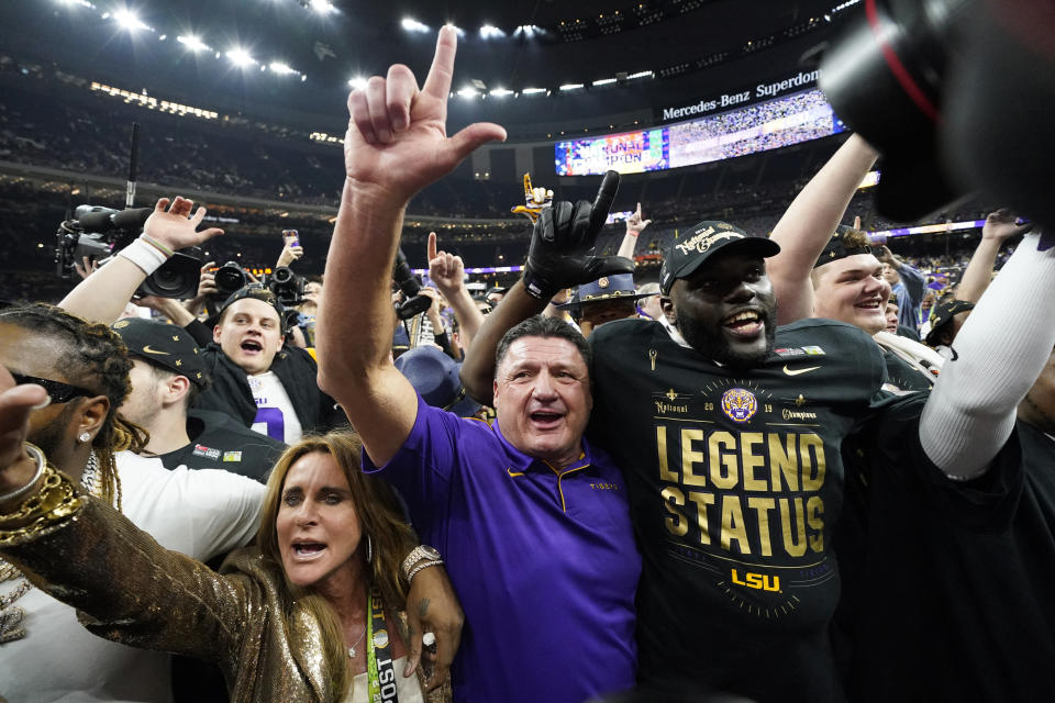 LSU head coach Ed Orgeron celebrates after their win in a NCAA College Football Playoff national championship game against Clemson, Monday, Jan. 13, 2020, in New Orleans. LSU won 42-25. (AP Photo/David J. Phillip)