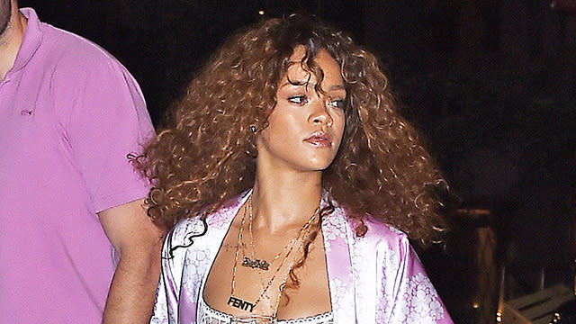 Ever wondered what Rihanna wears too bed? You don't have to guess any longer! Granted, we've seen her in many states of undress before -- and even various pajama fashions -- but RiRi went for a full-on bedtime look when she was spotted in New York City late Friday night. <strong>WATCH: Alex Trebek Singing 'Umbrella' Makes Us Uncomfortable </strong> The "Bitch Better Have My Money" singer stepped outside a recording studio in midtown Manhattan leaving little about her nighttime routine to the imagination. Her pale pink heart-and-flower two-piece set was left open to show off a very toned tummy; layers of gold accessories, including a nameplate necklace that said "Fenty" in all caps and a body chain; and a sheer, see-through white bralette -- with her nipples clearly visible. Because isn't that what we all wear on the busy streets of NYC? Getty Images She completed the look with fuzzy heels and a drink in hand. <strong>WATCH: Rihanna Found a Dog at a Club & Decided to Keep Him </strong> If we were getting a late night music session in, we'd probably want to be as comfortable as possible, too. The 27-year-old Barbados native has been working on her eighth studio album, which will include some of her already released hit singles like "FourFiveSeconds" and "BBHMM." It looks like Rihanna and Miley Cyrus come from the same school of thought: Namely, it's my body, and I'll show you it if I want to. Girl power? Relive Rihanna's bonkers "BBHMM" music video below.