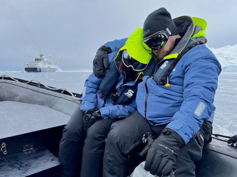 Two of my friends cuddling for warmth as we made our way back to the ship.