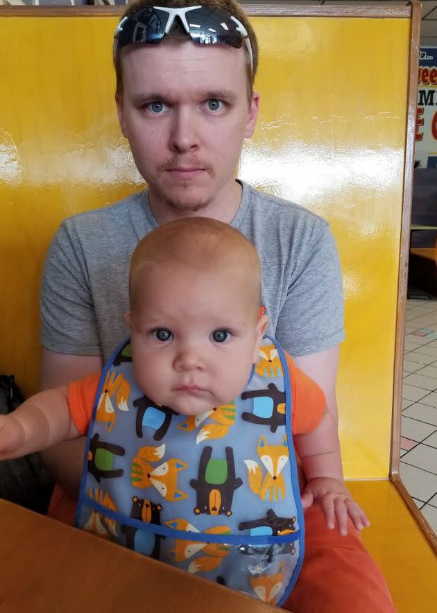 The writer's husband and their oldest son sit in an ice cream parlor in Gainesville, Florida. (Photo: Courtesy of Gillan Ritchie)