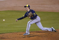 Milwaukee Brewers relief pitcher Eric Yardley throws to a Los Angeles Dodgers batter during the second inning in Game 1 of a National League wild-card baseball series Wednesday, Sept. 30, 2020, in Los Angeles. (AP Photo/Ashley Landis)