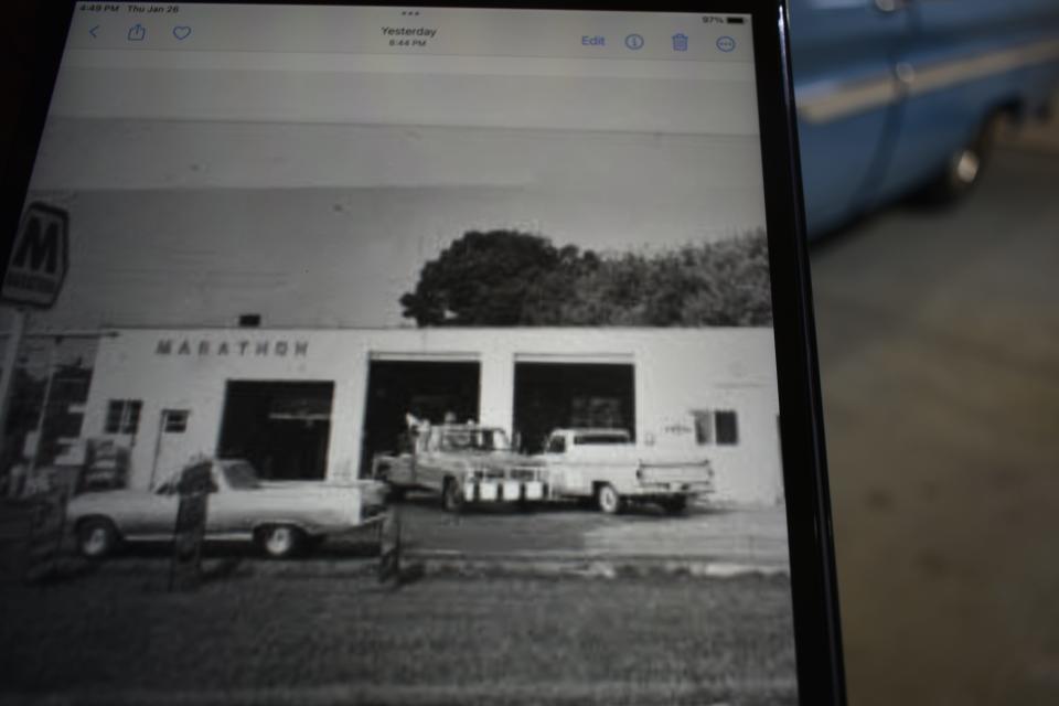 This 1970s photo shows Paul Sims' 1965 Chevrolet truck, far right, parked at his Marathon station