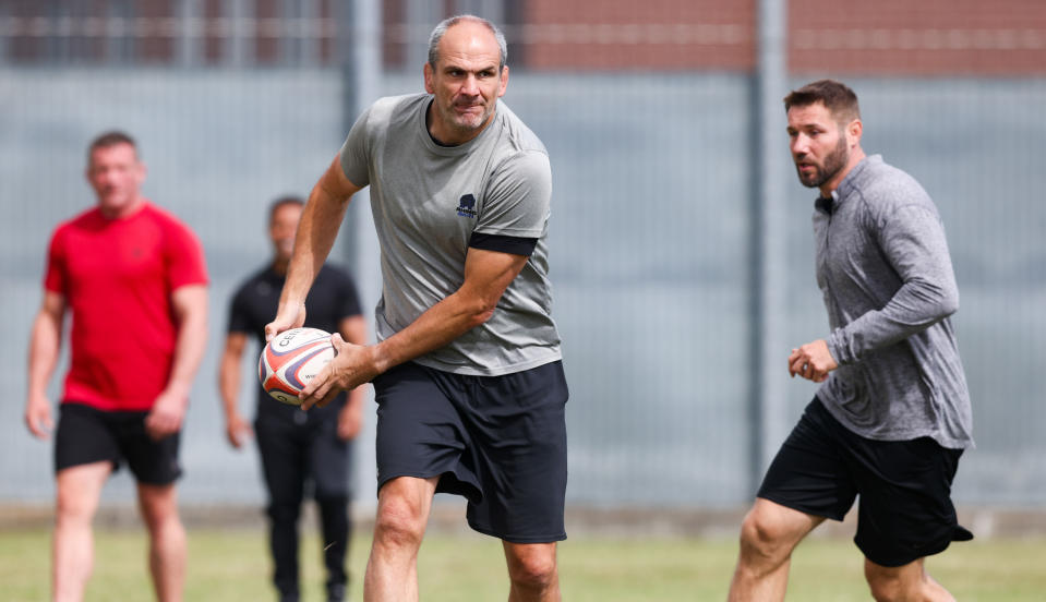 Martin Johnson in action alongside Ben Cohen (on right).