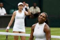 Britain Tennis - Wimbledon - All England Lawn Tennis & Croquet Club, Wimbledon, England - 1/7/16 USA's Serena Williams reacts as USA's Christina McHale celebrates during their match REUTERS/Stefan Wermuth