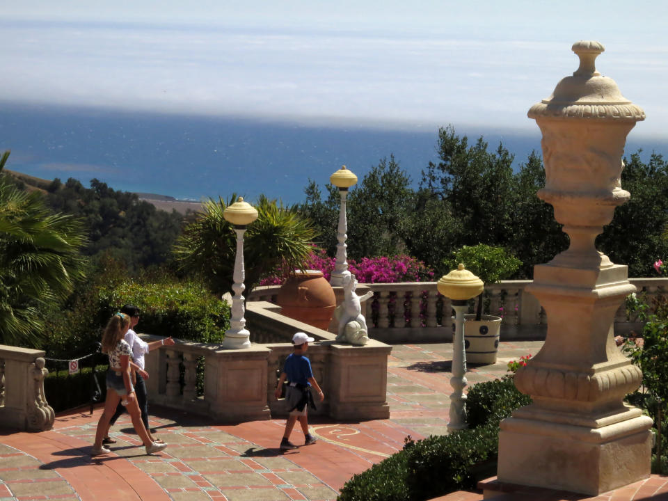 This Aug. 30, 2013 photo shows the exterior of Hearst Castle, the 165-room estate of newspaper publisher William Randolph Hearst, in San Simeon, Calif. Visitors can tour the estate which he called "La Cuesta Encantada" ("The Enchanted Hill"), that overlooks the Pacific Ocean. (AP Photo/Jim MacMillan)