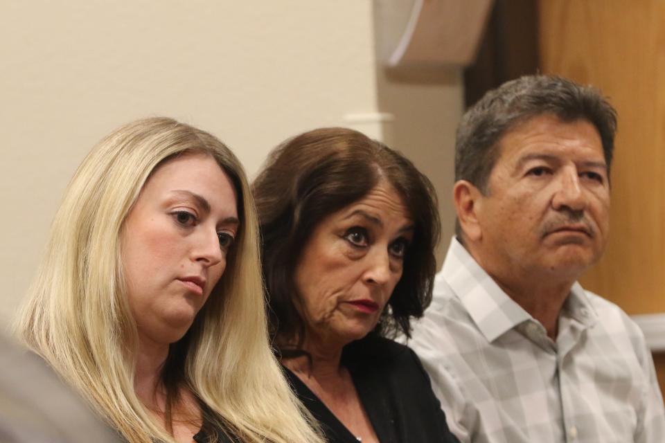 Members of Christopher Cordova's family listen to testimony during a hearing on Cordova's appeal of his firing, April 10, 2024 at the Janel Whitlock Municipal Annex in Carlsbad.