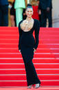 <p>It wasn't so much Hadid's Schiaparelli dress that will be forever etched in our minds but her gold, statement necklace that covered her exposed chest. (Getty Images)</p> 