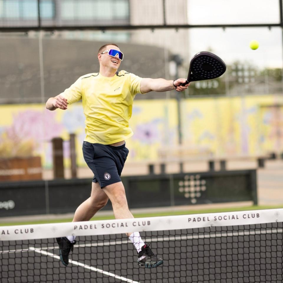 Alex Barton plays padel