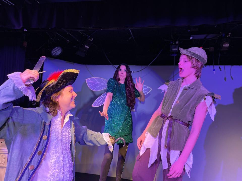 J Swindell, left, plays Captain Hook, Melissa Minix plays Tinker Bell, and Jayce Swindell plays Peter Pan in Footlight Players' production of “The Lost Boy” that opens May 3 and continues through May 12, 2024, at the community theater in Michigan City.