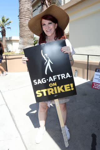 <p>jfizzy/Star Max/GC Images</p> Kate Flannery walks the picket line for the SAG-AFTRA