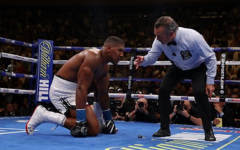 Andy Ruiz Jr knocks down Anthony Joshua in the seventh round during their IBF/WBA/WBO heavyweight title fight at Madison Square Garden on June 01, 2019 in New York City - Credit: Getty Images