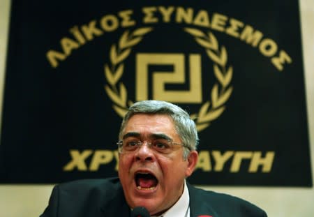 FILE PHOTO: Leader of extreme-right Golden Dawn party Nikolaos Mihaloliakos talks at a news conference in Athens