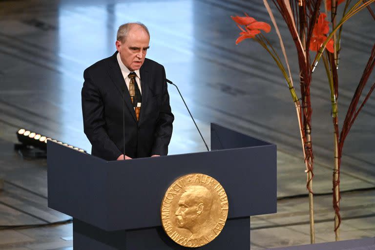 Memorial chairman Yan Rachinsky on behalf of 2022 Nobel Peace Prize winner Russian human rights organisation Memorial delivers a speech during the 2022 Nobel Peace Prize award ceremony at the City Hall in Oslo, Norway, on December 10, 2022. (Photo by Sergei Gapon / AFP)