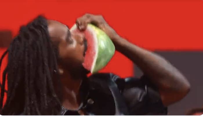 black guy eating watermelon gif