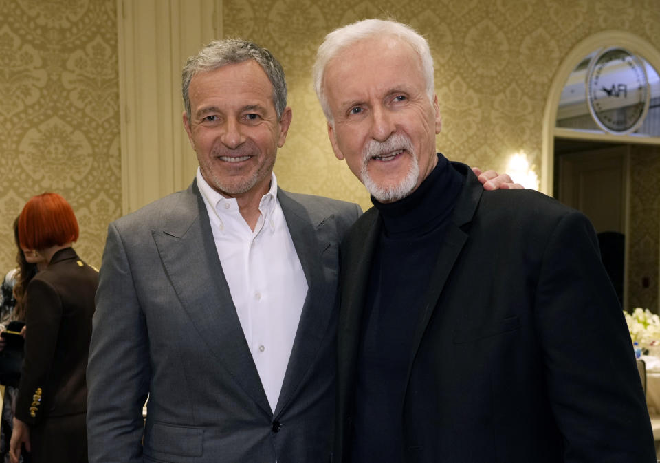 Robert Iger, left, CEO of The Walt Disney Company, poses with director James Cameron at the 2023 AFI Awards, Friday, Jan. 13, 2023, at the Four Seasons Beverly Hills in Los Angeles. (AP Photo/Chris Pizzello)