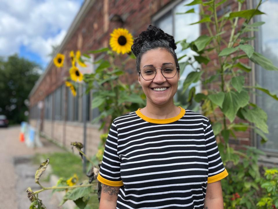 Lacey Smith, community support supervisor for the Burlington Police Department, pictured next to the police station in August 2023. Smith has worked in the Burlington area as a social worker for 15 years and thinks the community needs to meet unhoused people where they're at.