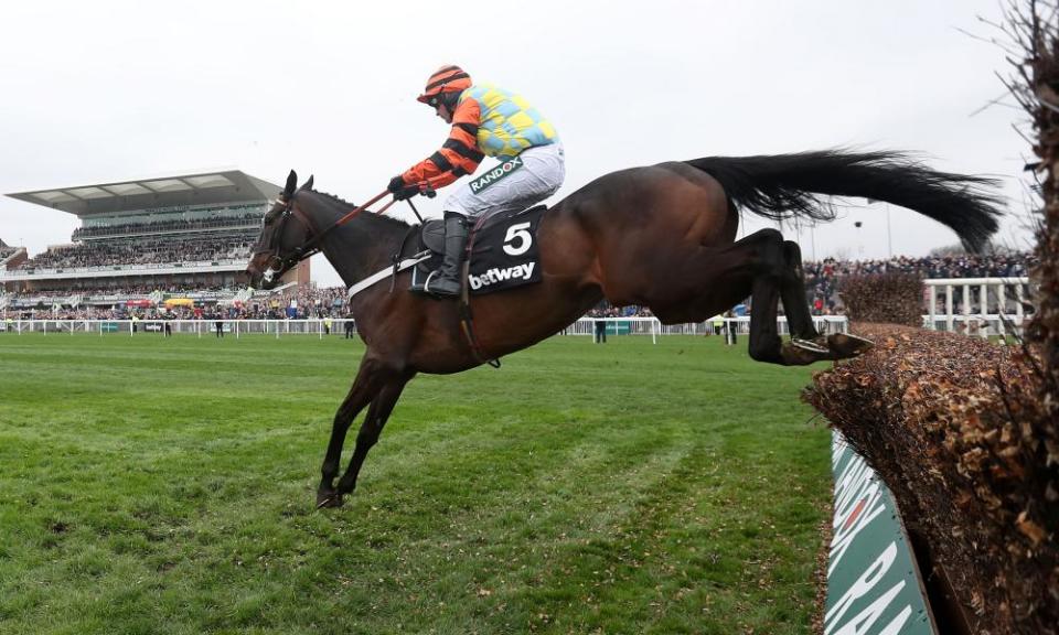 Might Bite jumps the last prior to winning the Betway Bowl Chase on day one of the Grand National meeting.