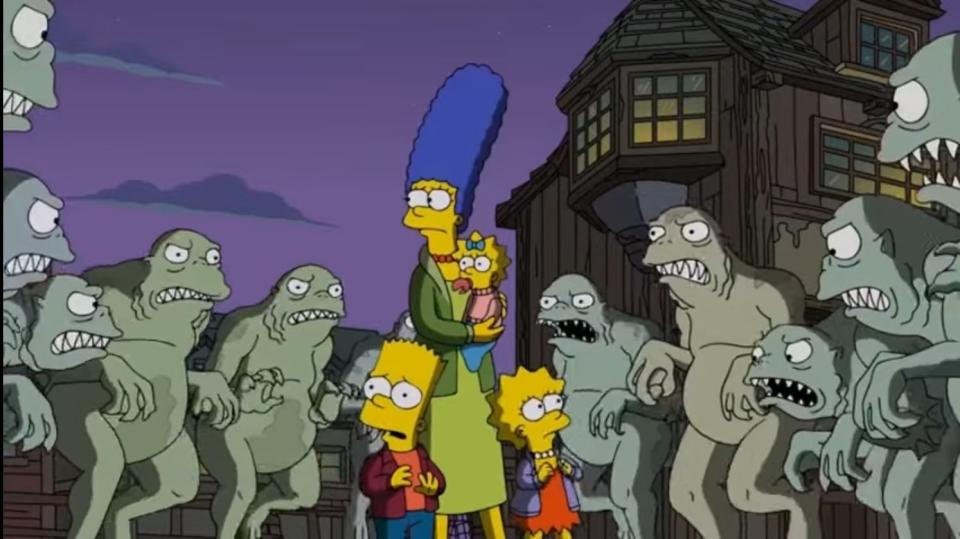 The Simpsons are surrounded by fanged fish people in "Treehouse of Horror XXIX"