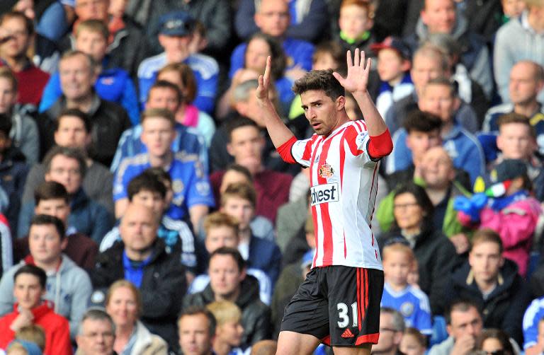 Sunderland's striker Fabio Borini celebrates after scoring his team's second goal from a penalty during an English Premier League football match between against Chelsea at Stamford Bridge in London on April 19, 2014