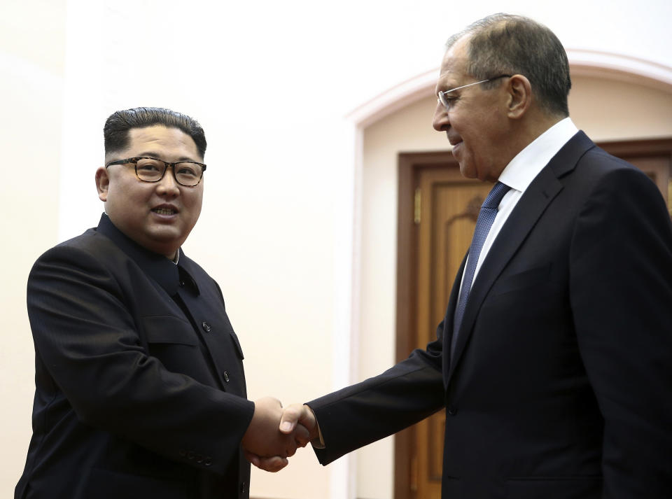 FILE - In this Thursday, May 31, 2018 file photo, Korean leader Kim Jong Un, left, and Russia's Foreign Minister Sergei Lavrov shake hands during a meeting in Pyongyang, North Korea. North Korea on Tuesday, April 23, 2019 confirmed that leader Kim Jong Un will soon visit Russia to meet with Putin in a rare summit. For Russia, a meeting with North Korean leader Kim Jong Un offers a chance to raise its influence in the region and gain more leverage with Washington. (Valery Sharifulin/TASS News Agency Pool Photo via AP, File)