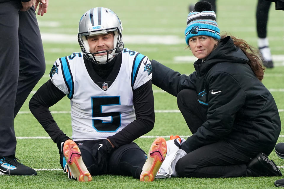 ORCHARD PARK, NEW YORK - DECEMBER 19: Kicker Zane Gonzalez #5 of the Carolina Panthers injures his knee during warm ups prior to the ganme against the Buffalo Bills at Highmark Stadium on December 19, 2021 in Orchard Park, New York. (Photo by Kevin Hoffman/Getty Images)