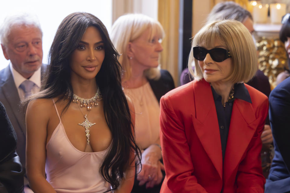 Kim Kardashian and Anna Wintour attend the Victoria Beckham Spring/Summer 2024 womenswear fashion collection presented Friday, Sept. 29, 2023 in Paris. (AP Photo/Vianney Le Caer)