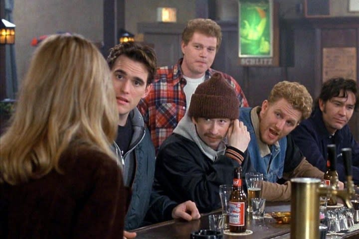 5 men look at a woman in Beautiful Girls.