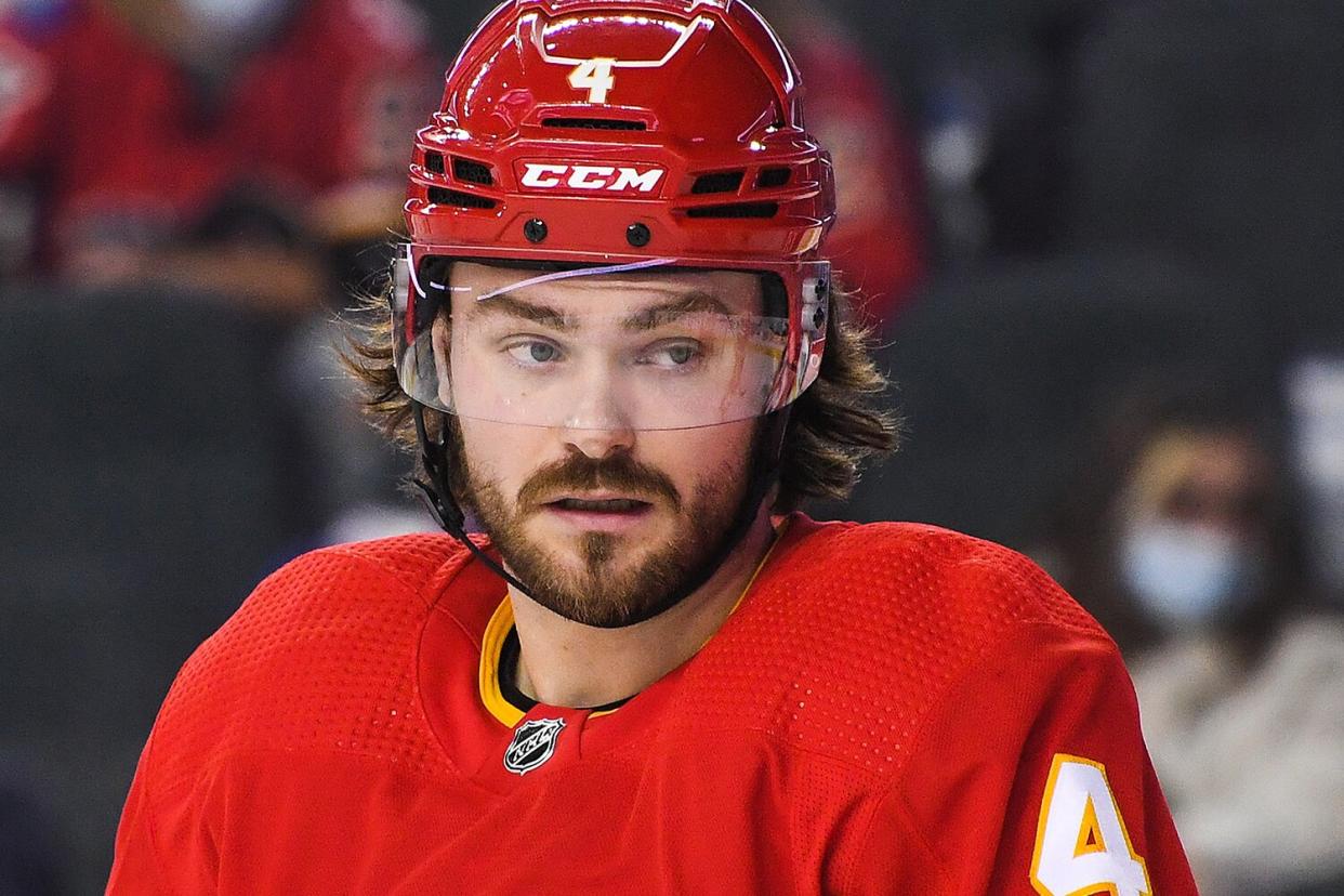 CALGARY, AB - JANUARY 13: Rasmus Andersson #4 of the Calgary Flames in action against the Ottawa Senators during an NHL game at Scotiabank Saddledome on January 13, 2022 in Calgary, Alberta, Canada. (Photo by Derek Leung/Getty Images)