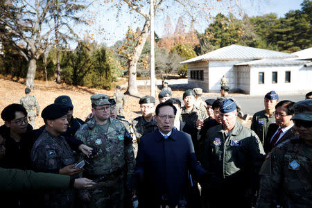 South Korean Defence Minister Song Young-moo speaks as he visits a spot where a North Korean has defected crossing the border on November 13, at the truce village of Panmunjom inside the demilitarized zone, South Korea, November 27, 2017. REUTERS/Kim Hong-Ji