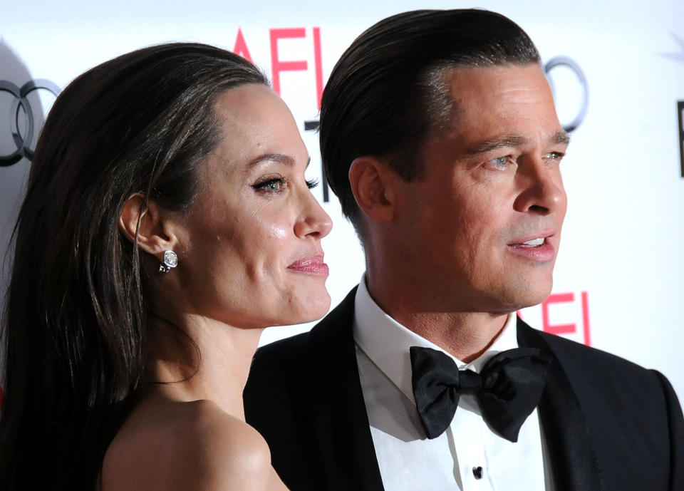 HOLLYWOOD, CA - NOVEMBER 05:  (L-R) Director/producer/writer/actress Angelina Jolie Pitt and actor/producer Brad Pitt arrive at AFI FEST 2015 Presented By Audi Opening Night Gala Premiere Of Universal Pictures' 'By The Sea' at TCL Chinese 6 Theatres on November 5, 2015 in Hollywood, California.  (Photo by Barry King/Getty Images)