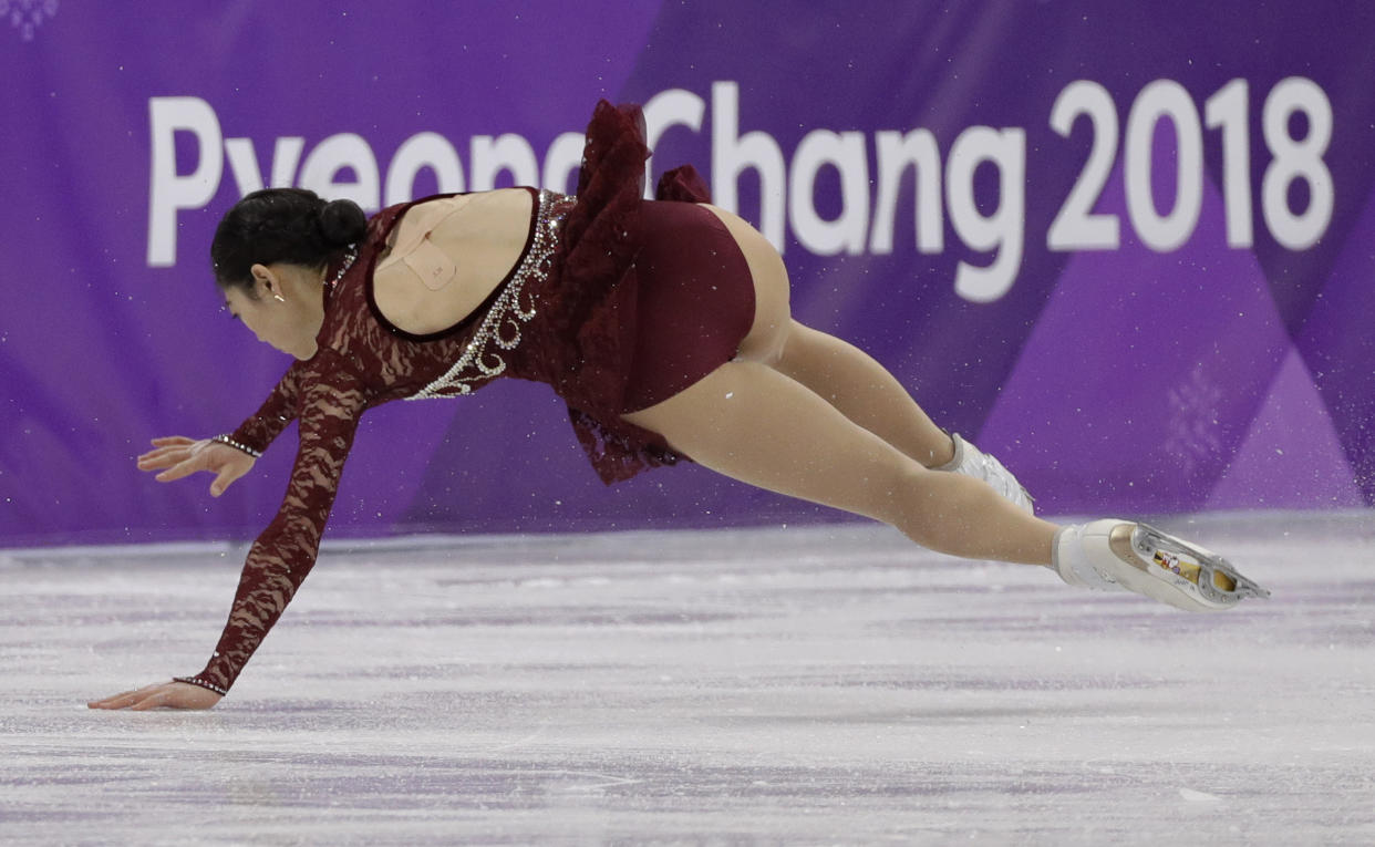 Mirai Nagasu of the United States falls during the women’s short program figure skating in the Gangneung Ice Arena. (AP)