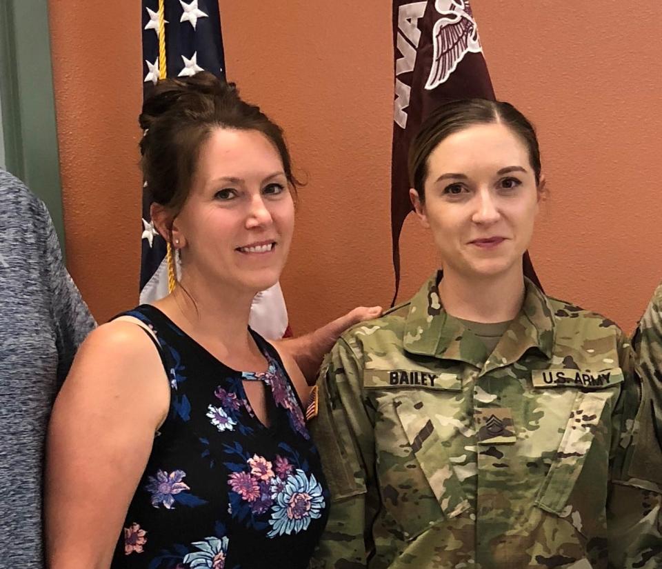 Felicia Cavanaugh, left, poses with her daughter Allison Bailey after Bailey was promoted to Sergeant First Class.