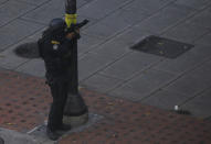 <p>A security forces member aims his weapon after clashes broke out with opposition supporters while the Constituent Assembly election was being carried out in Caracas, Venezuela, July 30, 2017. (Carlos Garcia Rawlins/Reuters) </p>