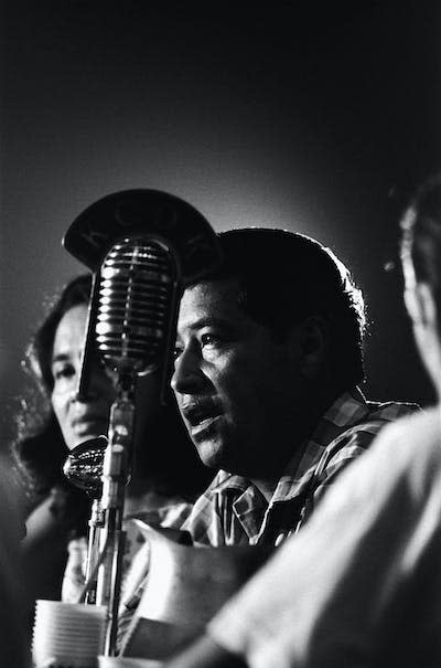 Cesar Chavez speaks at a union rally. <a href="https://www.gettyimages.com/detail/news-photo/cesar-chavez-the-organizer-and-leader-of-the-national-farm-news-photo/576842724?phrase=Cesar%20Chavez%201966&adppopup=true" rel="nofollow noopener" target="_blank" data-ylk="slk:Ted Streshinsky/Corbis via Getty Images;elm:context_link;itc:0;sec:content-canvas" class="link ">Ted Streshinsky/Corbis via Getty Images</a>