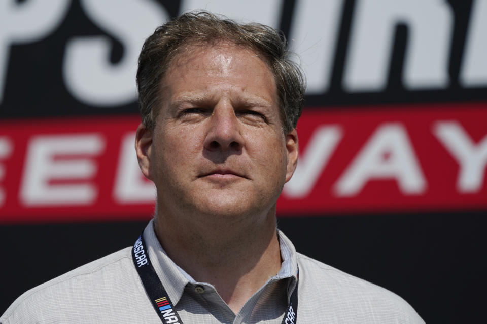 FILE - New Hampshire Gov. Chris Sununu arrives for the NASCAR Cup Series auto race at the New Hampshire Motor Speedway, Sunday, July 17, 2022, in Loudon, N.H. Until late last year, New Hampshire's Republican Gov. Chris Sununu was widely expected to run for U.S. Senate, taking on Democratic Sen. Maggie Hassan. Instead, he opted to seek a fourth two-year term as governor, dealing a major blow to Republicans who had hoped he could help them retake control of the Senate. (AP Photo/Charles Krupa, File)