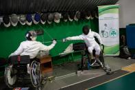 Wisam Sami, a 29 year-old Iraqi refugee, trains wheelchair fencing at Apostolos Nikolaidis stadium in Athens