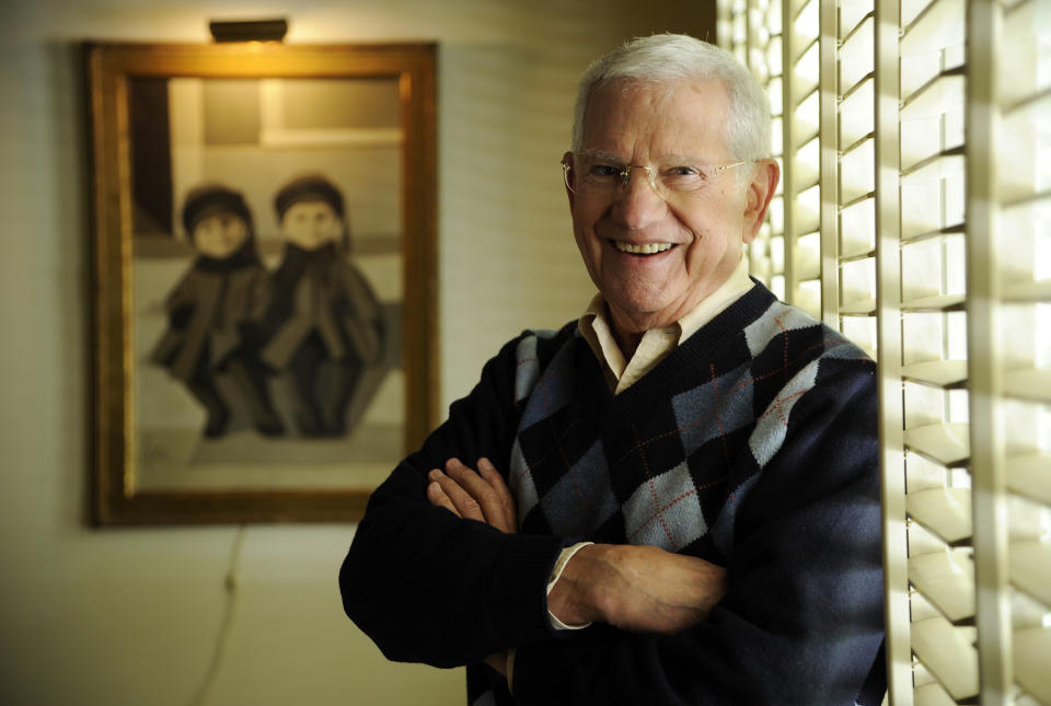 FILE - Actor, artist and singer Robert Clary poses for a portrait in his home studio on Feb. 26, 2014, in Beverly Hills, Calif. Clary, who played a prisoner of war in the TV sitcom “Hogan’s Heroes,” died Wednesday of natural causes at his home in Beverly Hills, Calif. He was 96. (Photo by Chris Pizzello/Invision/AP, File)