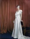 <p>Eleanor Roosevelt poses once again—this time almost 10 years later at the start of her husband's fourth term—in a white silk ball gown for the inaugural ball in 1945.<br></p>