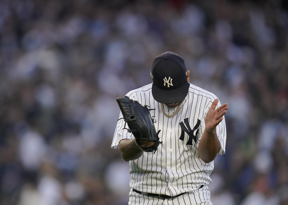 New York Yankees starting pitcher Nestor Cortes (65) reacts as he walks off the field at the end of the top of the fifth inning of Game 5 of an American League Division baseball series against the Cleveland Guardians, Tuesday, Oct. 18, 2022, in New York. (AP Photo/Frank Franklin II)